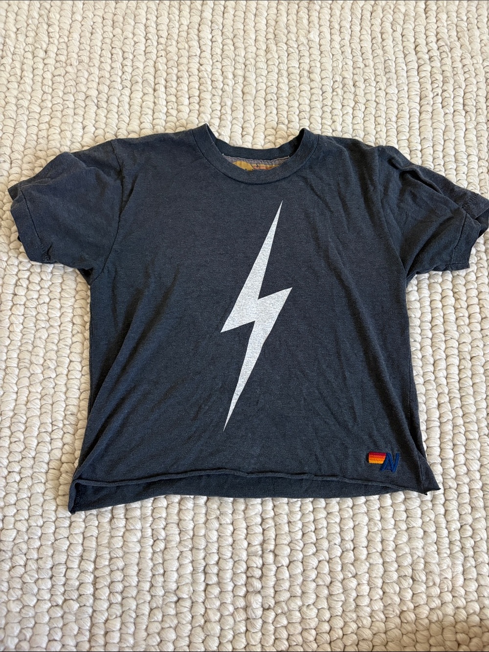 Aviator Nation Black Tee with White Lightning and Small Rainbow Patch